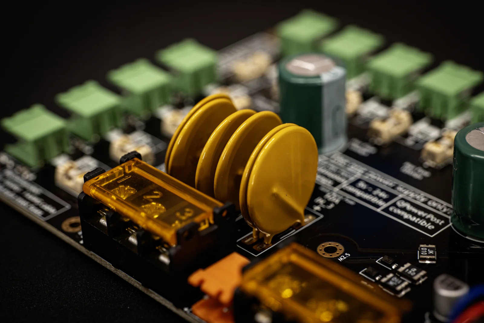 Macro of gold auto-reset PTC fuses on the Power-5HV input stage